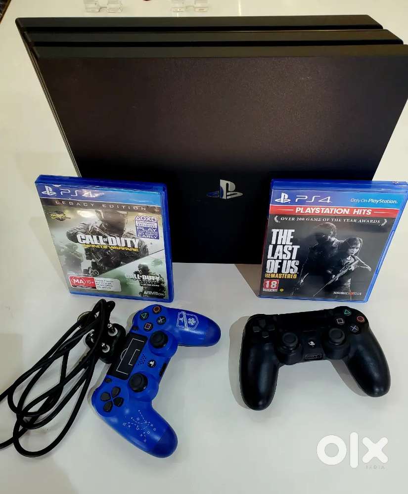 PLAYSTATION 4PRO 1TB WITH 2 CONTROLLER & 2GAMES