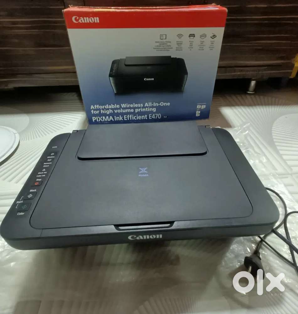 Canon PIXMA E470 All in One (Print, Scan, Copy) WiFi Ink Efficient.