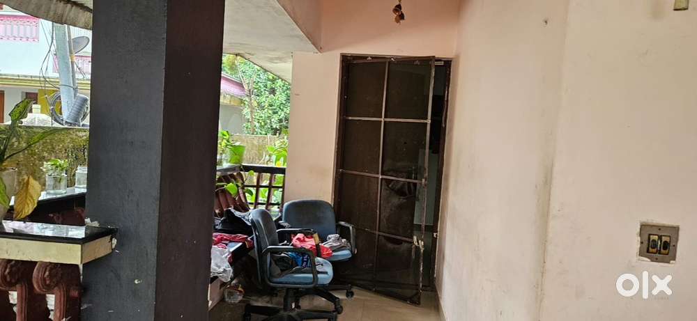 6 cents of land with an old house for sale at Eroor