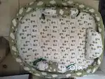 Baby bedding with 3 coushions and mosquito net in good condition