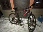 Gair cycle of red colour with black shed