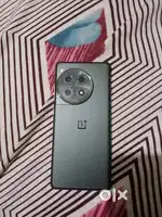 One plus 12r 16gb 256gb (11 month warranty with bill box charger