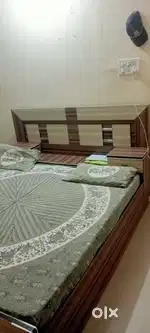 Double bed with orthopaedic mattress