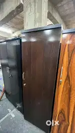 Brand new single door wooden almari in brownish colour