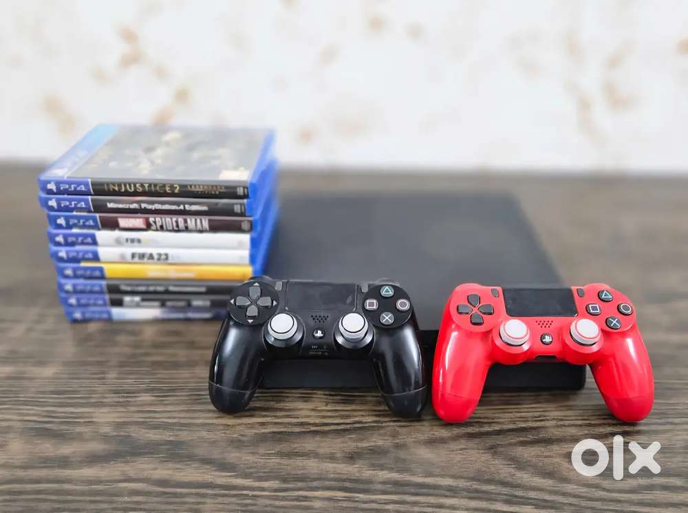 Ps4 with 9 games and 2 controllers and a cooler