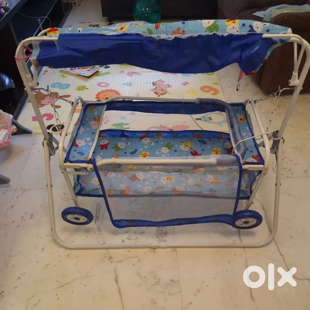 Baby cradle with mosquito net and swing