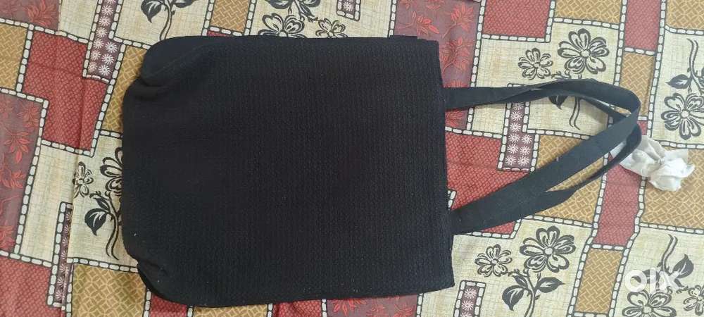 A long black jute bag