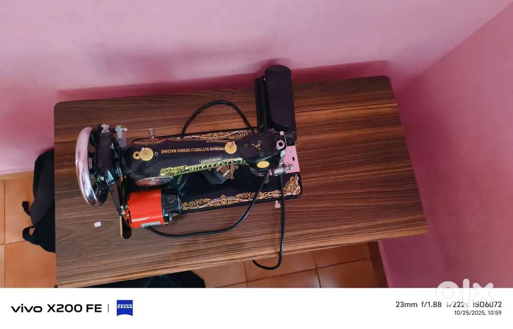 Tailoring machine and motor