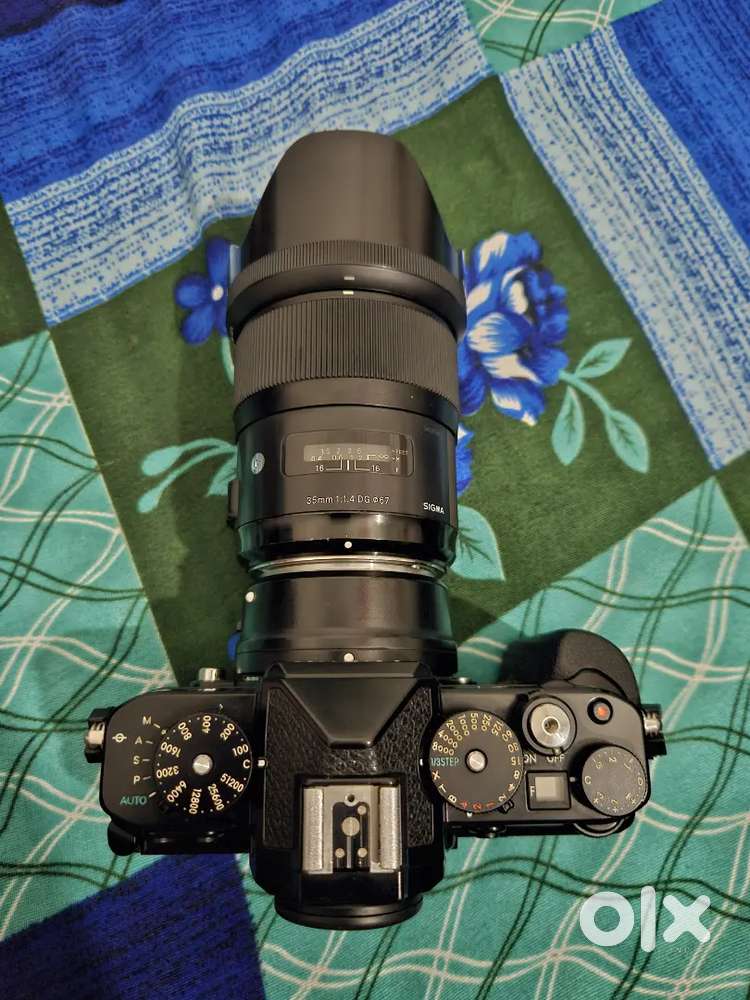 Nikon Zf with Sigma 35mm 1.4 and nikon 85mm .