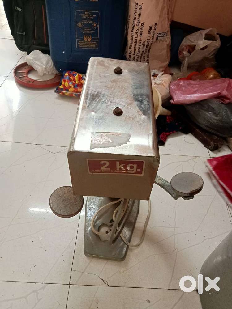 Aata ghutne ki machine