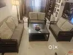 FOR SALE: 7-Seater Wooden Sofa Set with Center Table