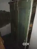 Wooden window with grill and wooden door