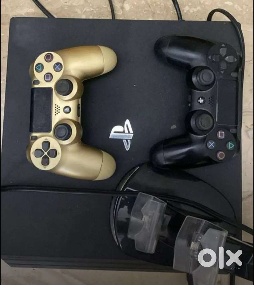 Ps4 Pro with 2 Controllers & 4 Games