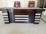 Selling this heavy office table with glass table top. No chairs