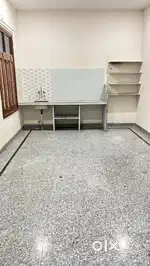 Room with attached kitchen for family