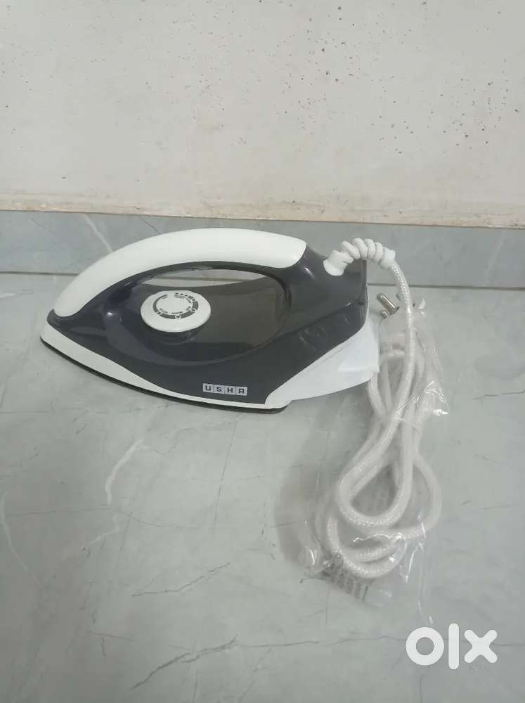 Usha electric iron New 2 yerr warranty
