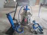 Manual milking machine