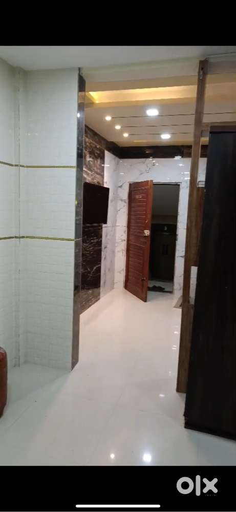1 bhk flat for sale good condition hall and kitchen wall tiles.