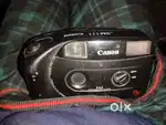 Canon camera, likely a point-and specifically a Canon F35.