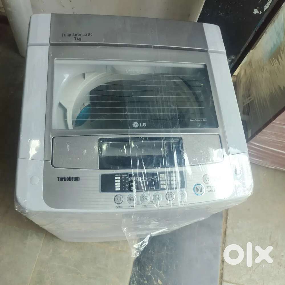 LG washing machine fully automatic top load with warranty 1 year old