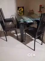 Diningtable & four chairs sell urgentlly...
