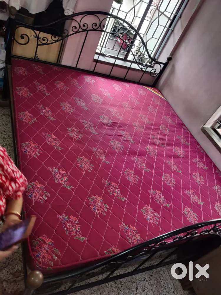 Double bed with matters for sale