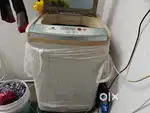 Old washing machine for sale in well working condition.