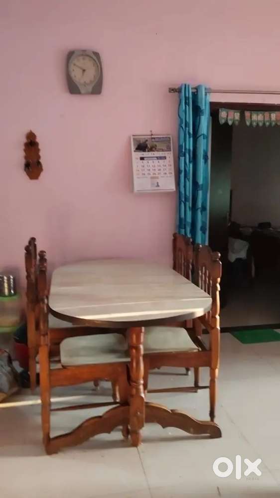 Teak wood dining table