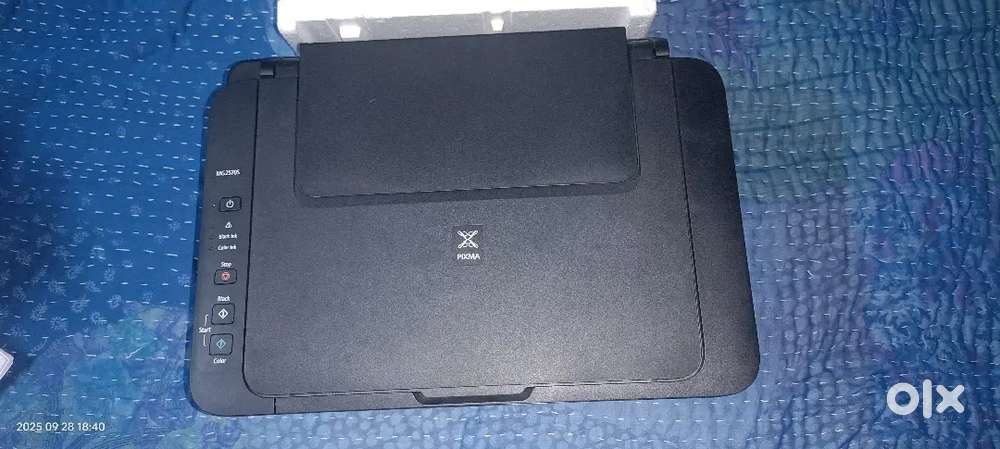 The image shows a Canon PIXMA All-in-One Inkjet Printer.