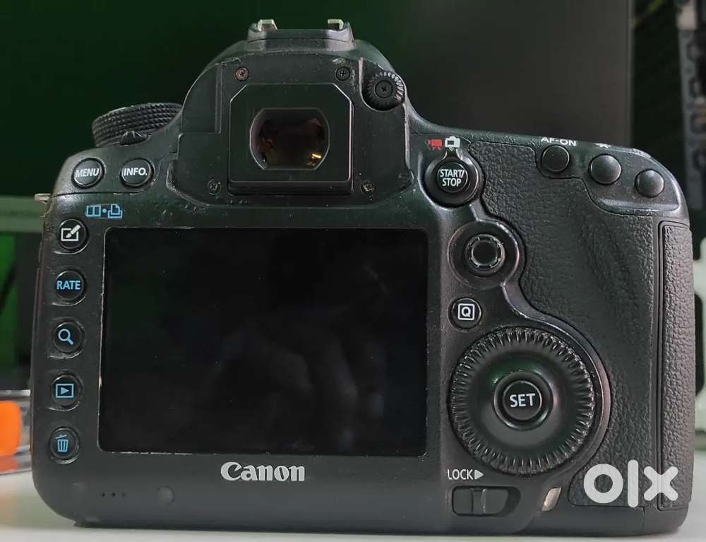 canon 5dm3 camera body , original battery charger           28000