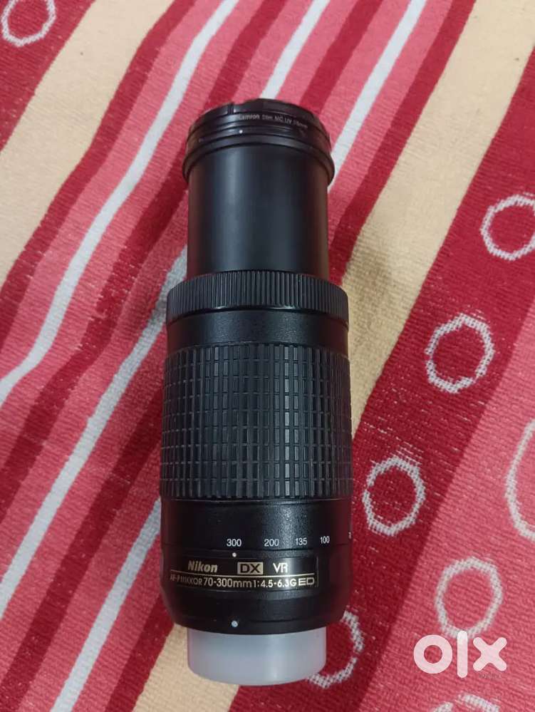 Nikon 70.300mm Zooming lens brand new condition