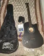 Acoustic guitar - Intern 38TC model . 15 days old . Urgent sale