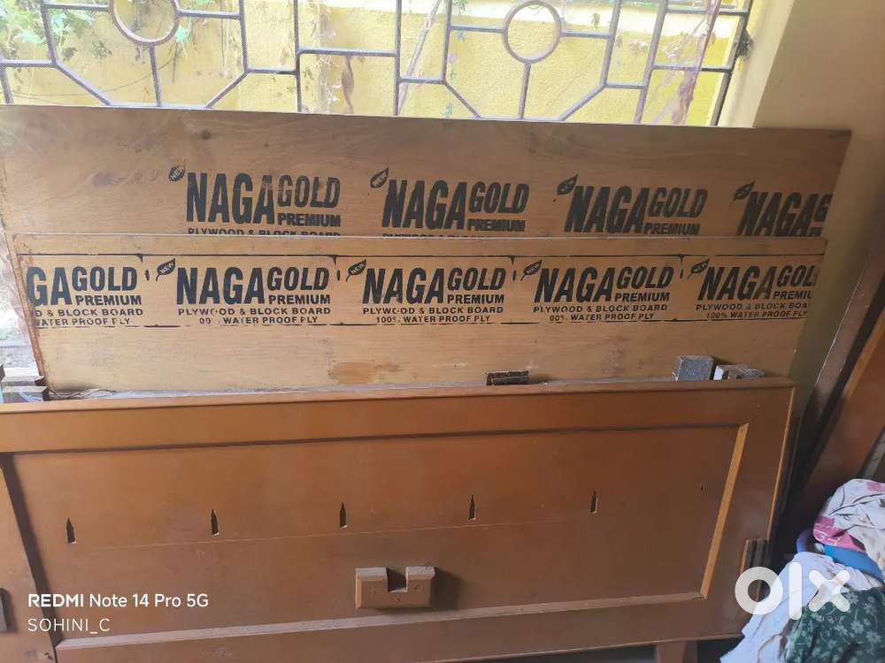 An old wooden bed with plywoods.