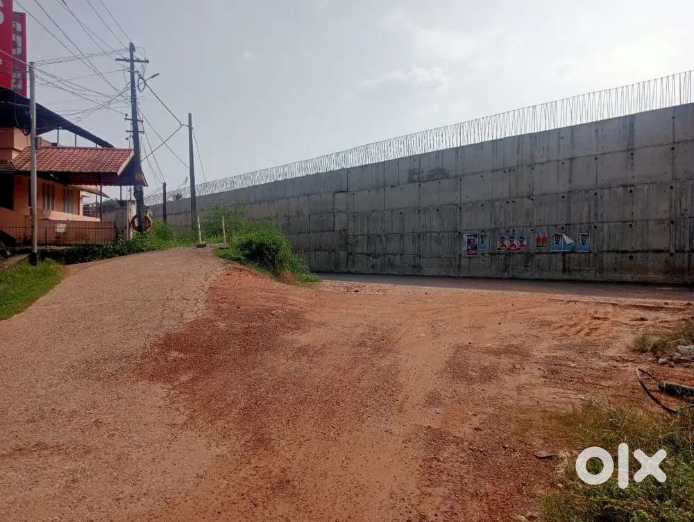 9 cent land with 3 bedroom house and  two shops