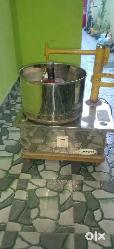 a kitchen appliance used for grinding grains and lentils