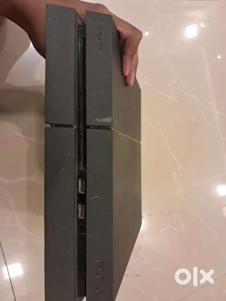 PlayStation 4 with Controller and 6 Games CDs