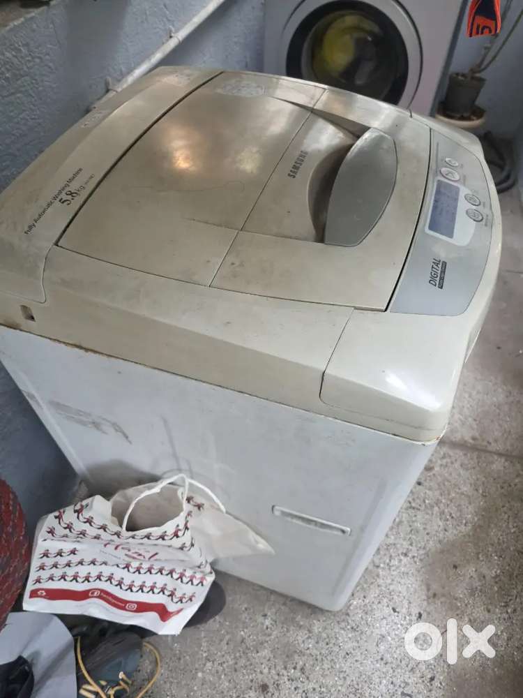 Washing Machine Old. Throwing away. Not in good condition