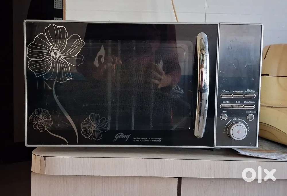 Godrej Microwave Oven,  proper and in working condition