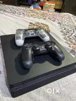 Play station 4 slim 1 tb with 2 controllers and 40+ games