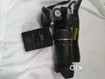 Nikon D3200 DSLR + 18-200mm Zoom Lens + Charger