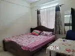 King size wooden cot