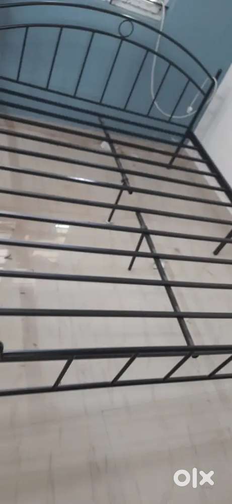 Queen size metal cot