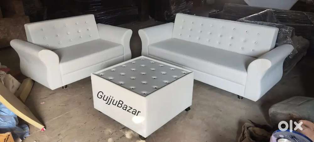 White sofa set with center table