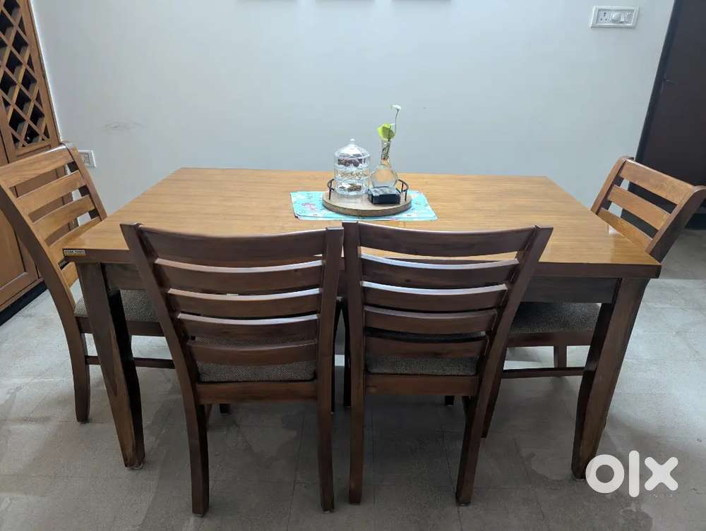 6 seater dining table , 4 chairs and 1 bench