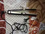 Vega hair straightener 3 in 1.