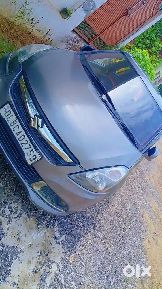 Maruti Suzuki Swift Dzire 2014 ( September)CNG and Petrol on paper