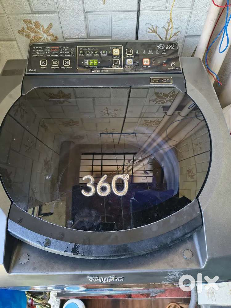 Old running washing machine for sale.
