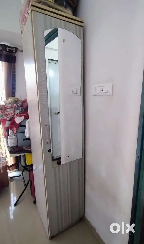 Single door wardrobe with mirror