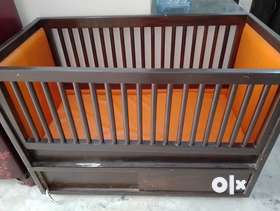 We are selling our children's bed. It is in very good condition. It is made of heavy wood and is 5 y...
