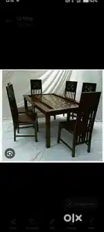 4 chair dining table available in Starf furniture